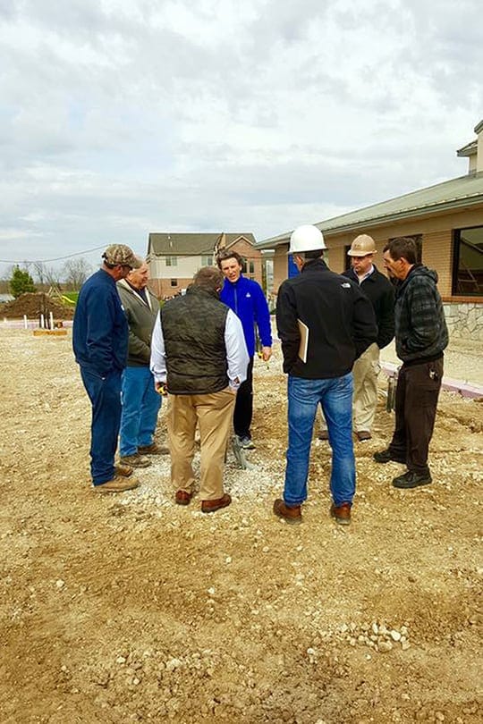 Jeff Carter Collaborating with contractors and clients on site