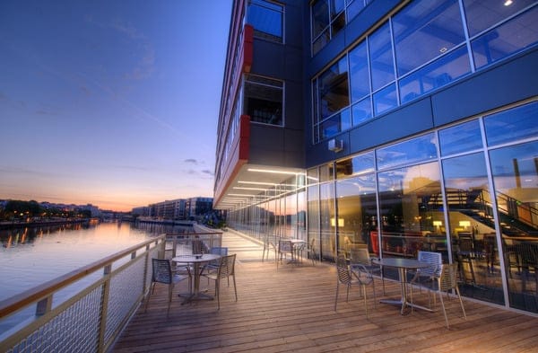 First floor transparency allows users of the riverwalk to peer into the creative world of Bader Rutter