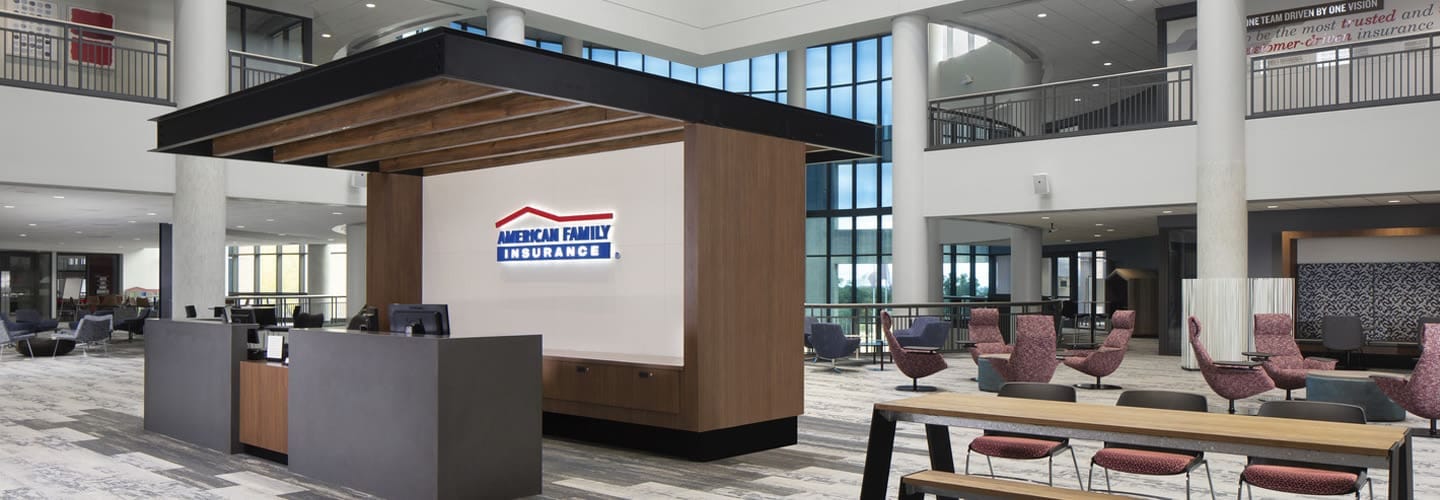 American Family Insurance Enterprises HQ, in Madison, Wisconsin. The lobby provides space for greeting visitors, employee socialization, and messaging of the corporate brand