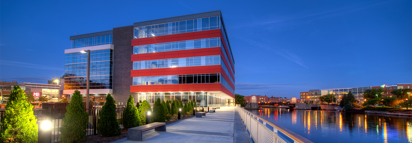 The adaptive re-use project expanded a dated Milwaukee retail landmark to house the new HQ of the Bader Rutter Agency. The new project enlivens the Milwaukee River and provides a new corporate workspace with trending workplace amenities.