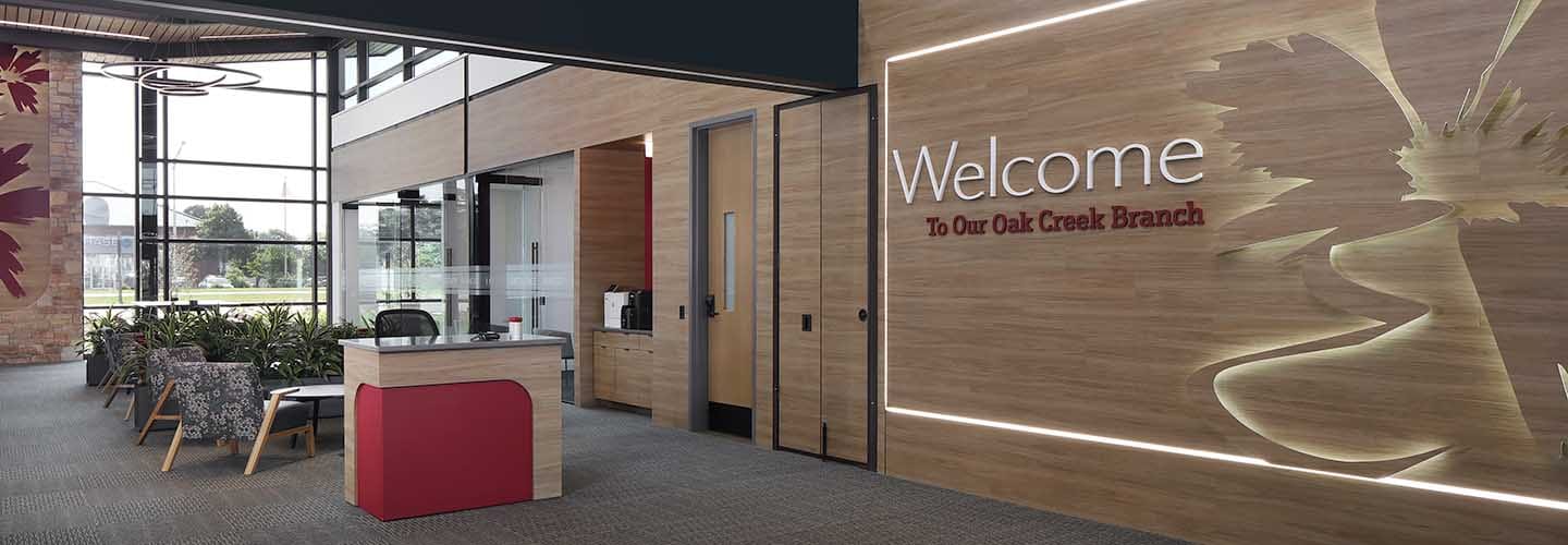 The design reflects Educators Credit Union’s trademark red color, flower logo and the brick used in its previous buildings.