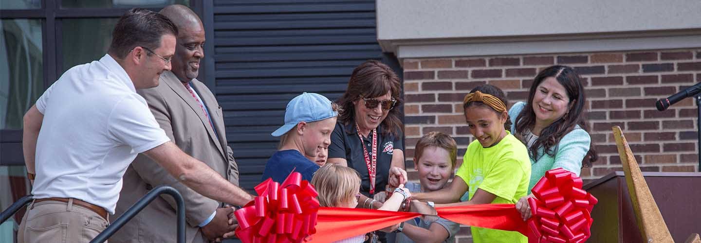 Ribbon Cutting at an elementary school in Wauwatosa,, Wisconsin, is a significant community event celebrating opportunity and aspiration for the future