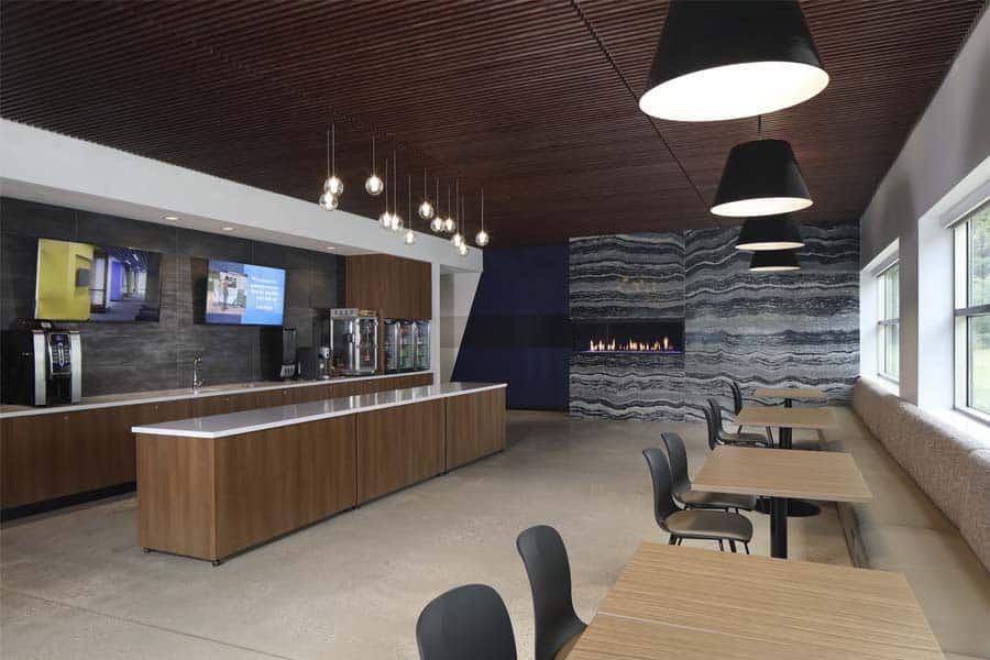 The cafe offers a place for employees to gather and features a fireplace