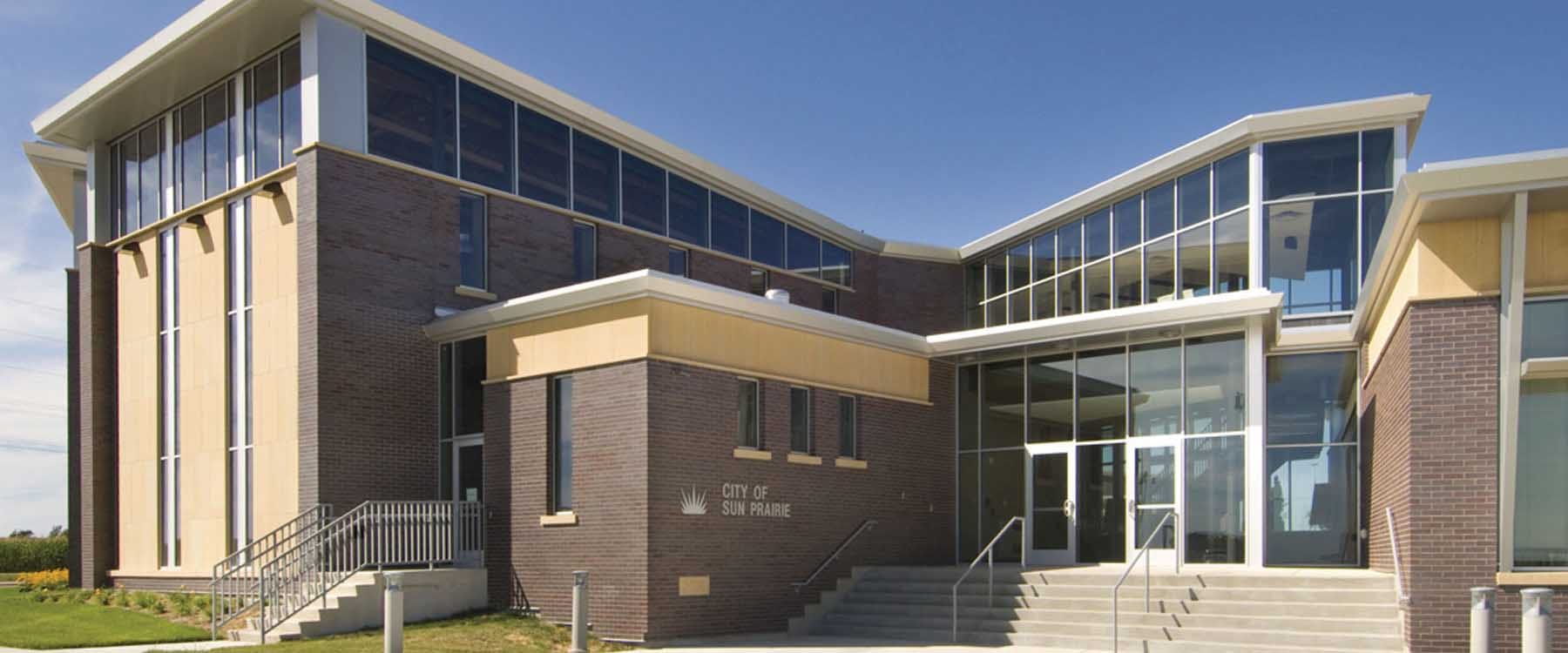 City Of Sun Prairie Community Service Building projects suitable ideals about civic architecture, and is designed to "hold the road" at a new traffic circle