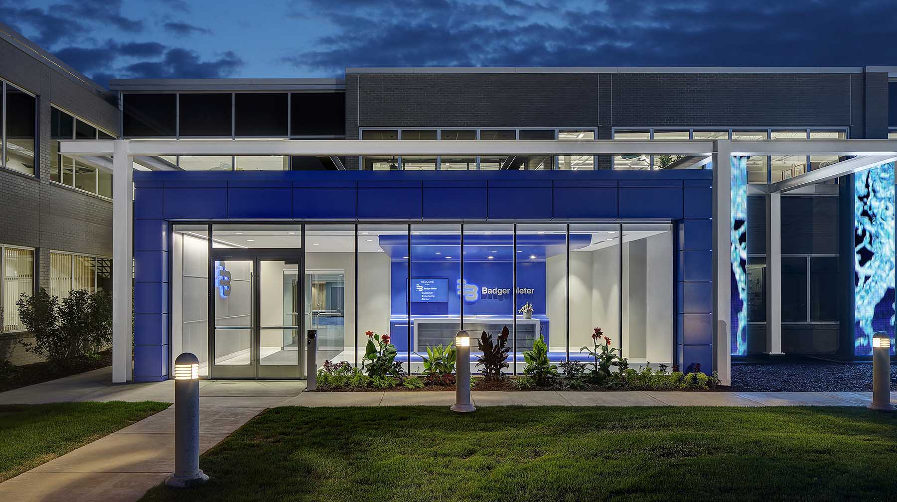 The design features a new façade clad in Badger Meter blue and featuring 3 high tech digital waterfalls.