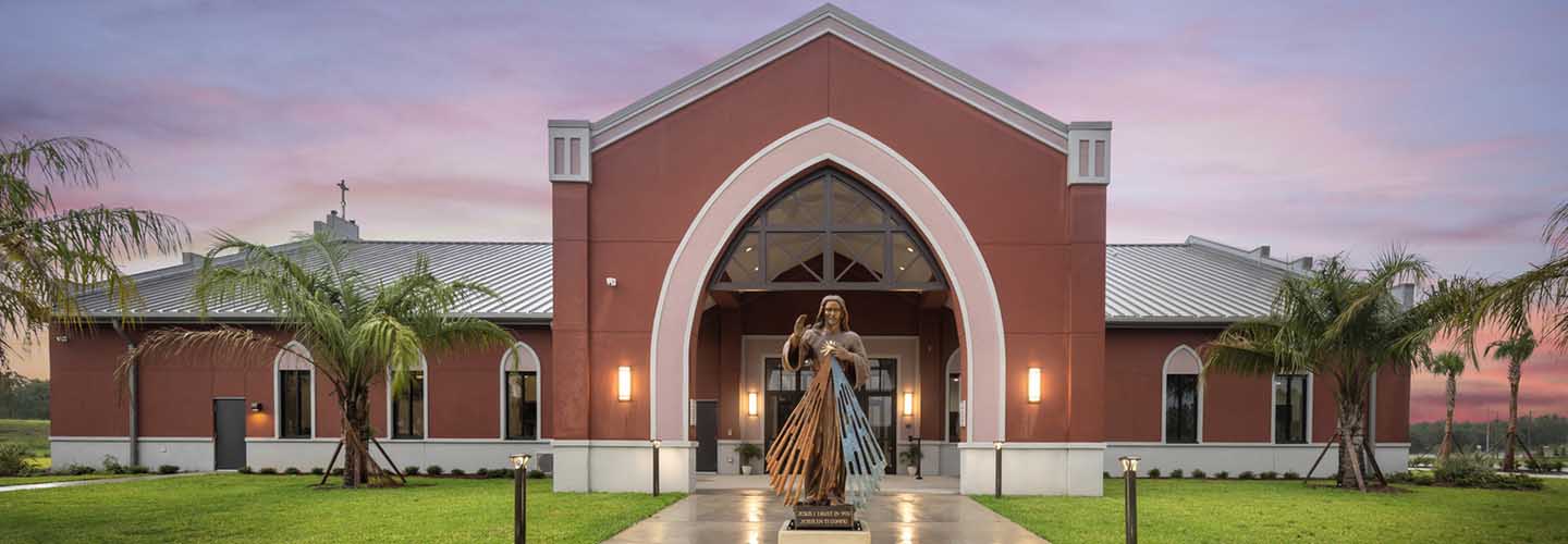 Gothic entrance to ST Faustina Parish Multipurpose Building in Clermont, Florida integrates Catholic Religious Symbolism